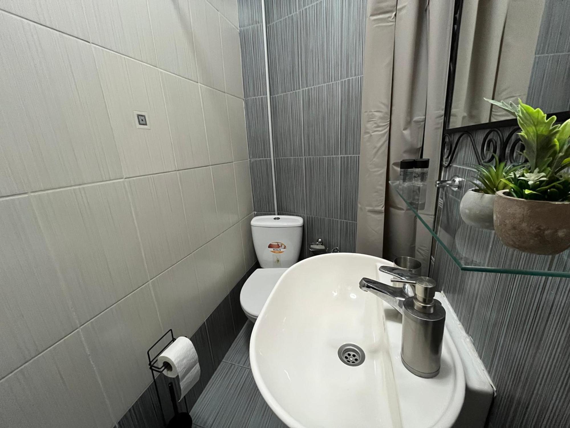 Central M - 5 Apartments Szkopje Szoba fotó